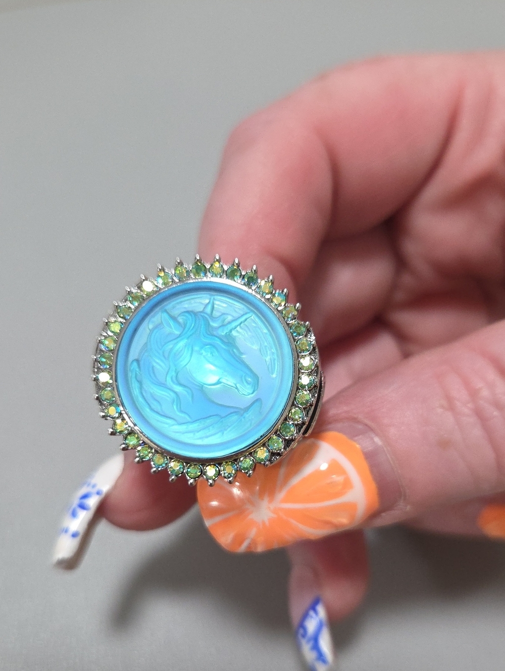 Kirks Folly Blue Unicorn Cameo Ring with Green Crystal Halo